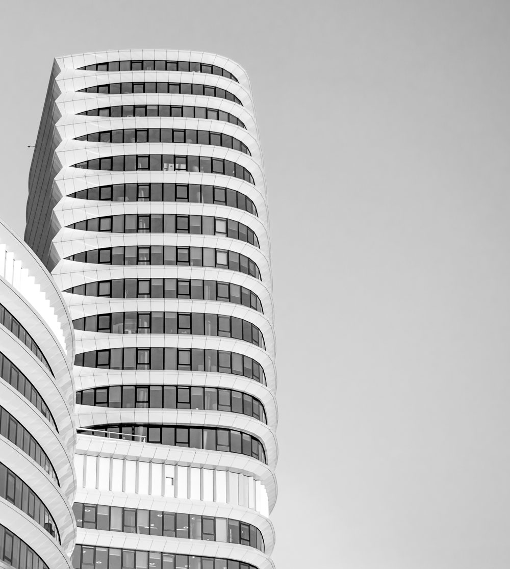 a part of a skyrise, geometrical with lots of windows